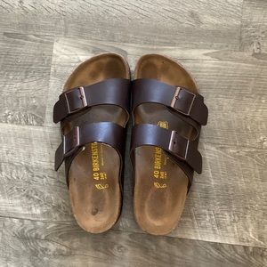 Brown Birkenstocks.